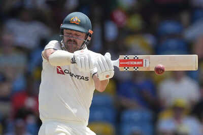 Travis Head celebrates a successful shot during the match.