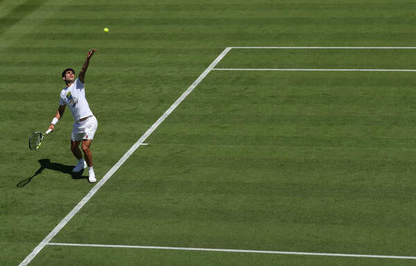 Carlos Alcaraz practices at Wimbledon 2025